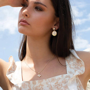 Murkani-Yellow Gold Mother of Pearl Floral Necklace with White Topaz